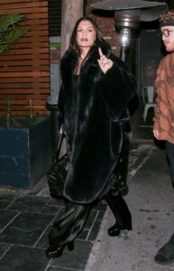 Jessie J in a Black Fur Coat