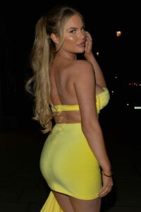 Kelsey Stratford in a Yellow Mini Dress