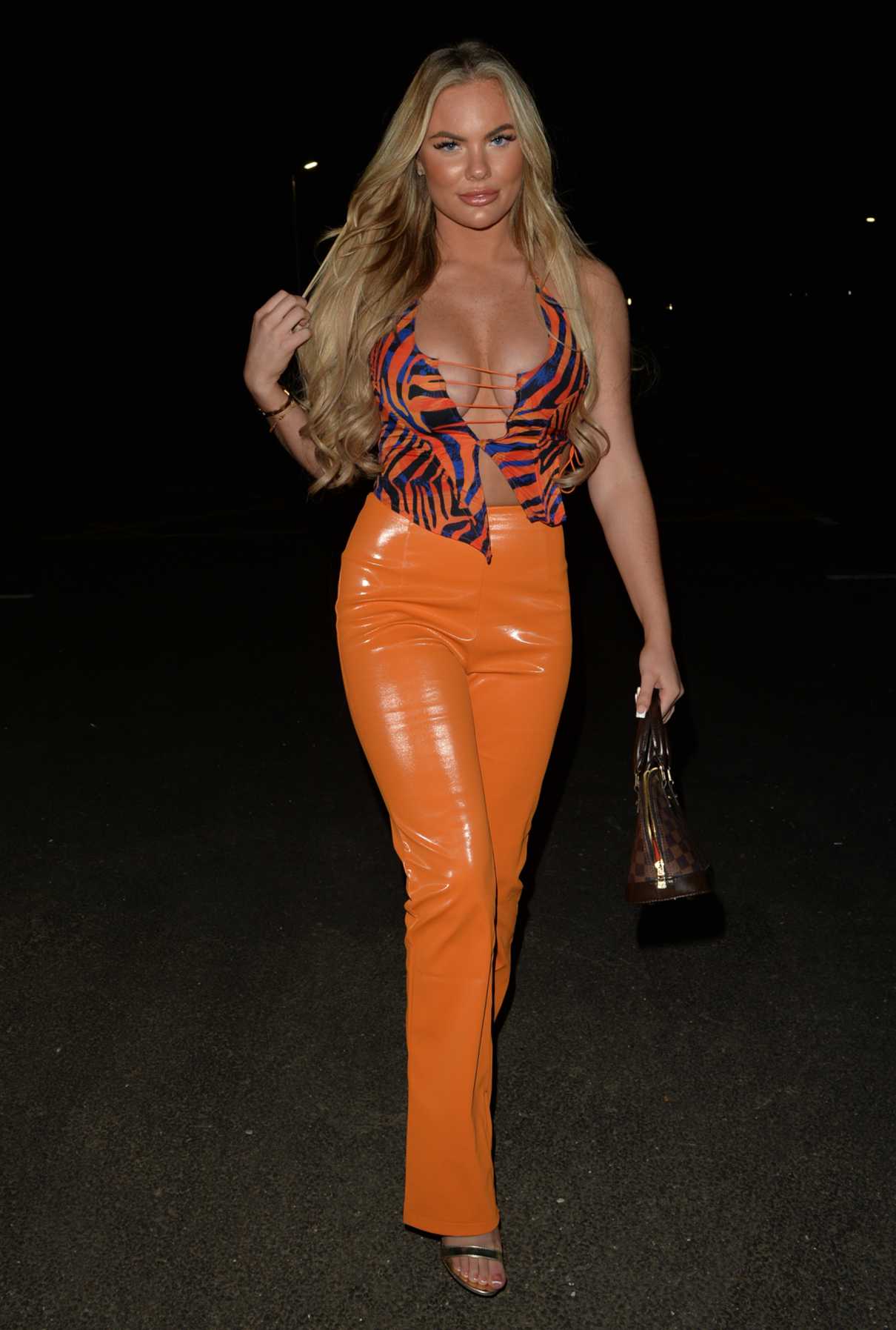 Kelsey Stratford in an Orange Pants