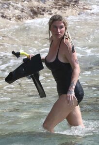 Kesha in a Black Swimsuit