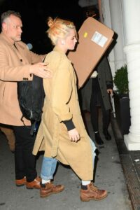 Kristen Stewart in a Yellow Trench Coat