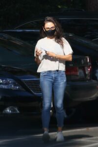 Mila Kunis in a Black Protective Mask