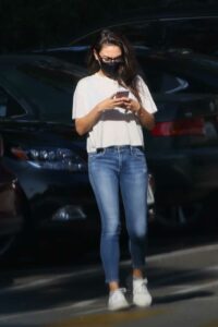 Mila Kunis in a Black Protective Mask