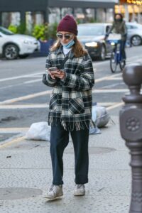 Natalia Dyer in a Plaid Jacket