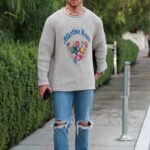 Nick Jonas in a Grey Sweatshirt Leaves the San Vicente Bungalows in West Hollywood 11/18/2021