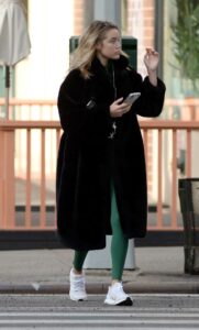 Olivia Ponton in a Black Fur Coat