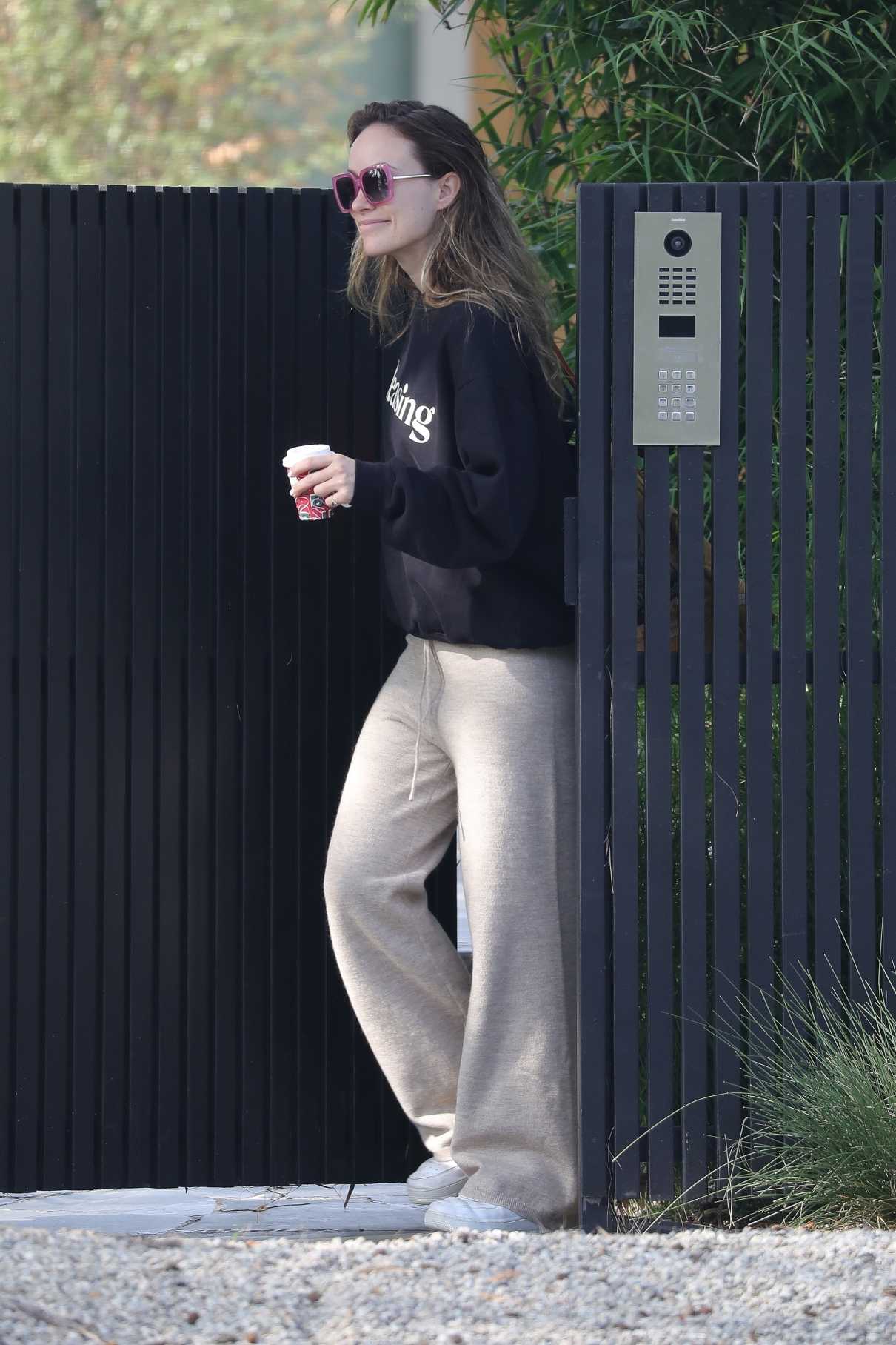 Olivia Wilde in a Black Sweatshirt