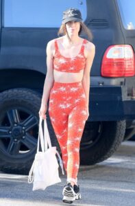 Scout Willis in a Red Colored Athleisure Ensemble