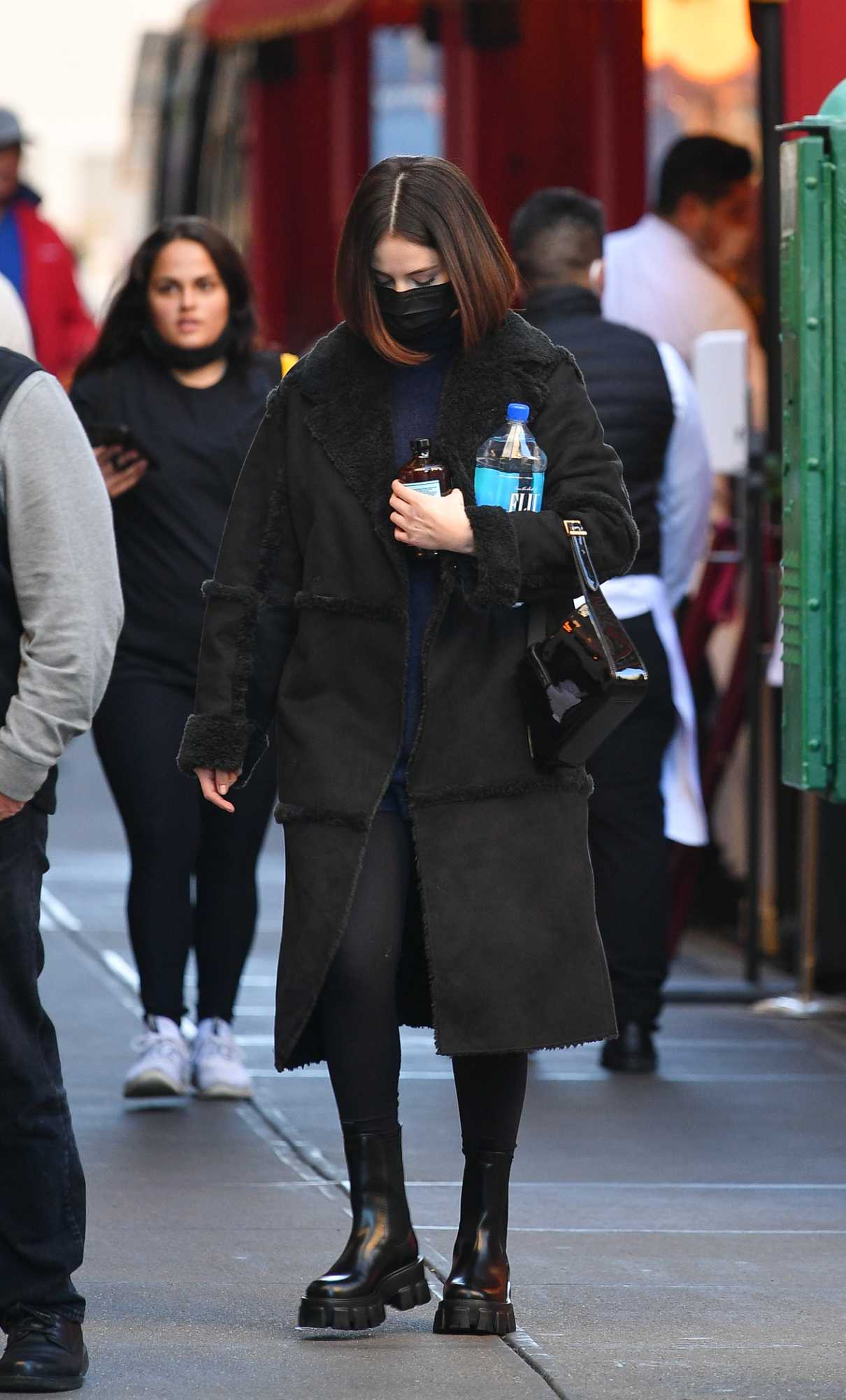 Selena Gomez in a Black Sheepskin Coat