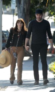 Zooey Deschanel in a Beige Pants