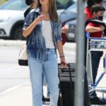 Alessandra Ambrosio in a White Sneakers Arrives in Florianopolis, Brazil 12/27/2021