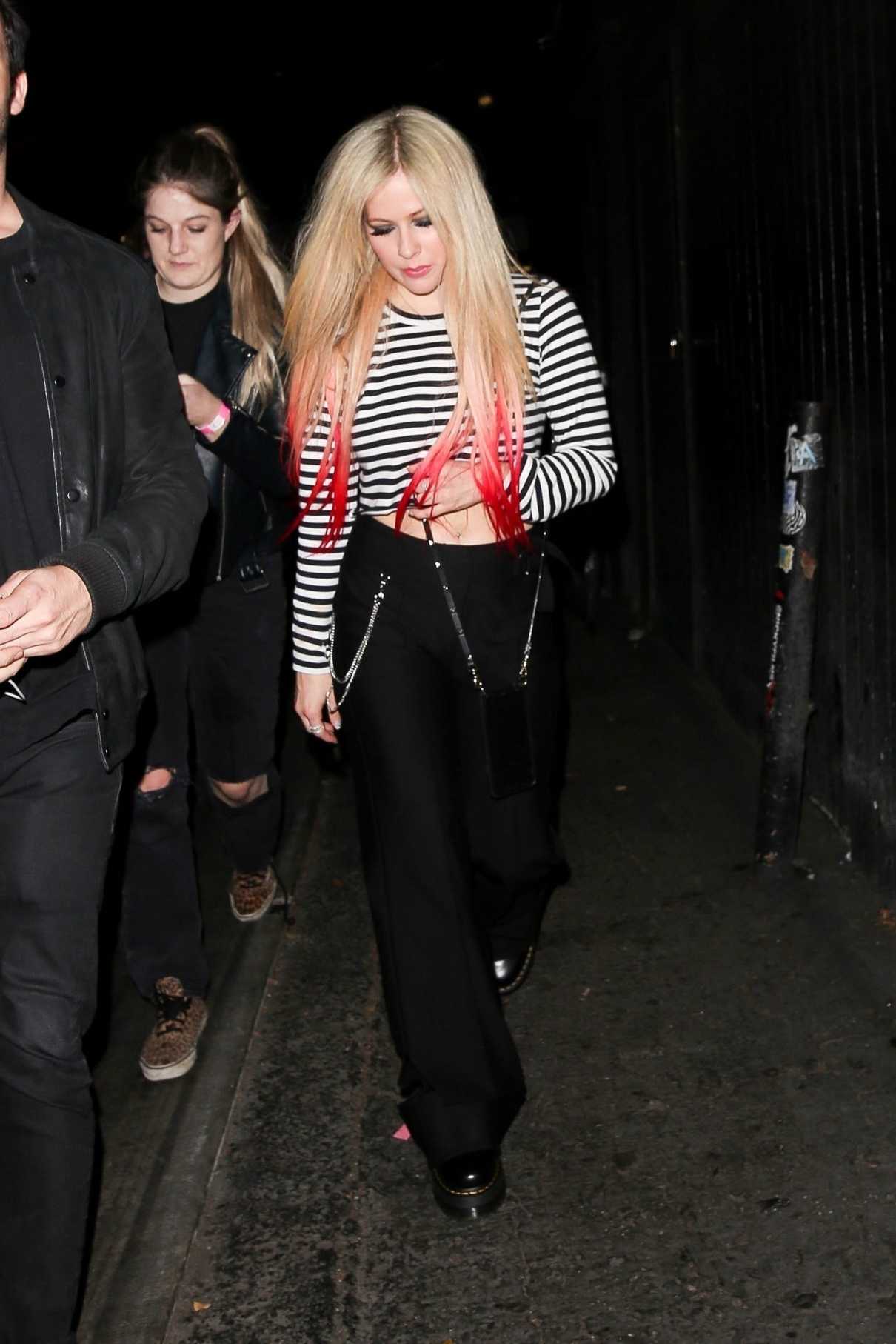 Avril Lavigne in a Striped Long Sleeves T-Shirt