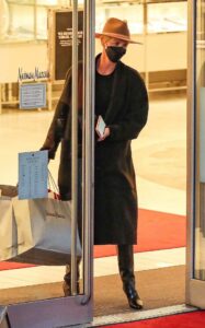 Charlize Theron in a Black Coat