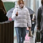 Jennifer Lopez in a White Puffer Jacket Braves the Rain in Los Angeles 12/23/2021