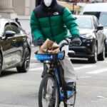 Joe Jonas in a Green Puffer Jacket Does a Bike Ride Out in New York 12/09/2021