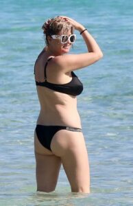 Josie Goldberg in a Black Bikini