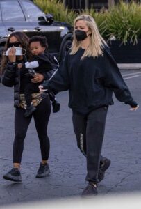 Khloe Kardashian in a Black Protective Mask