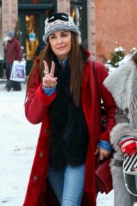 Kyle Richards in a Red Winter Coat