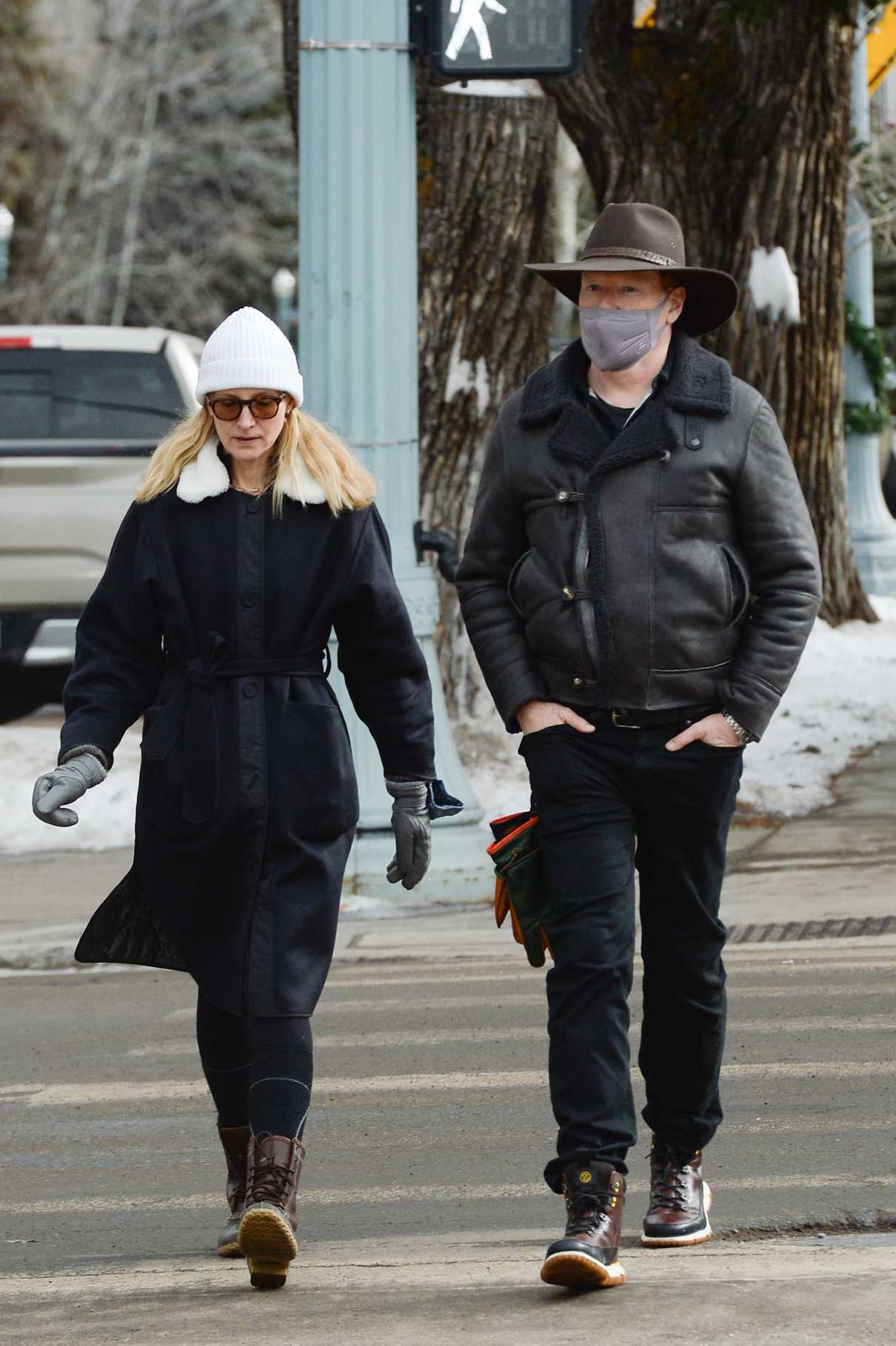 Liza Powel in a White Beanie Hat Was Seen Out with Conan O’Brien in