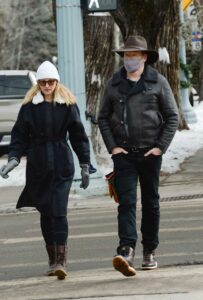 Liza Powel in a White Beanie Hat