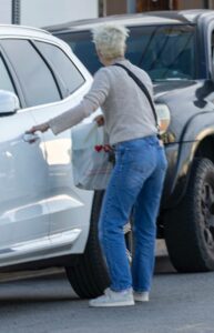 Selma Blair in a Grey Sneakers