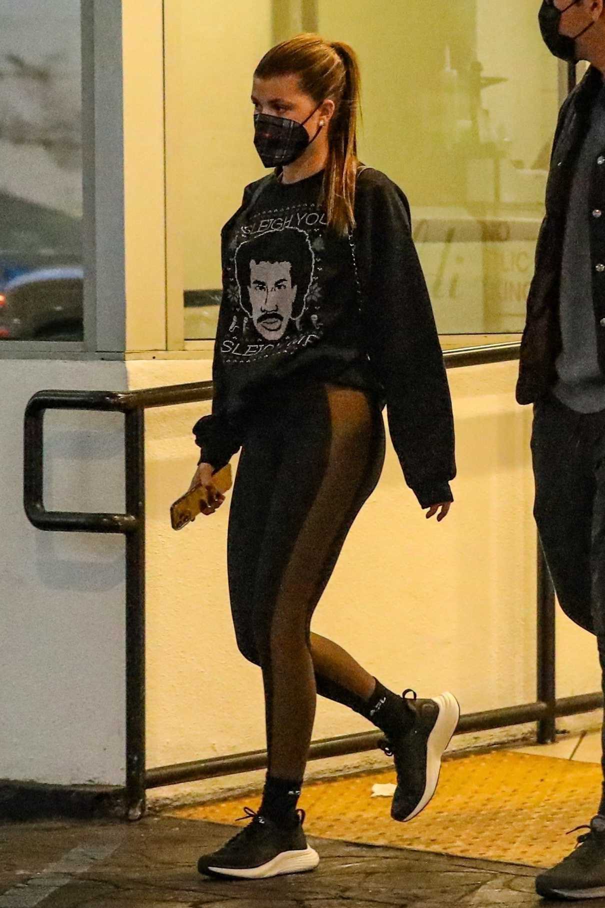 Sofia Richie in a Black Lionel Richie Sweatshirt