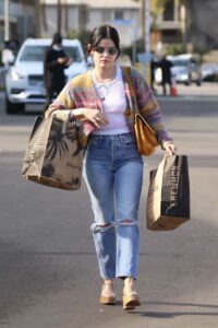 Lucy Hale in a Blue Ripped Jeans