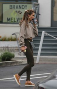 Alessandra Ambrosio in a Tan Cropped Hoodie