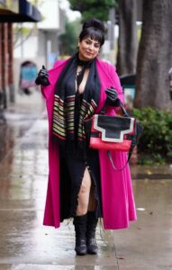 Alice Amter in a Pink Coat