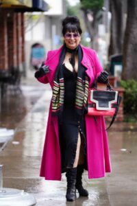 Alice Amter in a Pink Coat