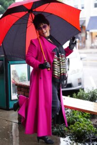 Alice Amter in a Pink Coat