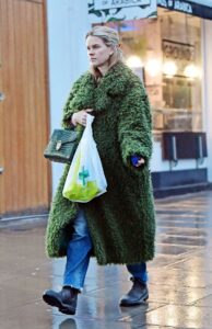 Alice Eve in a Green Faux Fur Coat