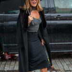 Amanda Holden in a Black Coat Arrives at the Global Radio House in London 01/04/2022
