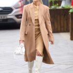 Ashley Roberts in a Beige Coat Leaves the Global Radio Studios in London 01/25/2022