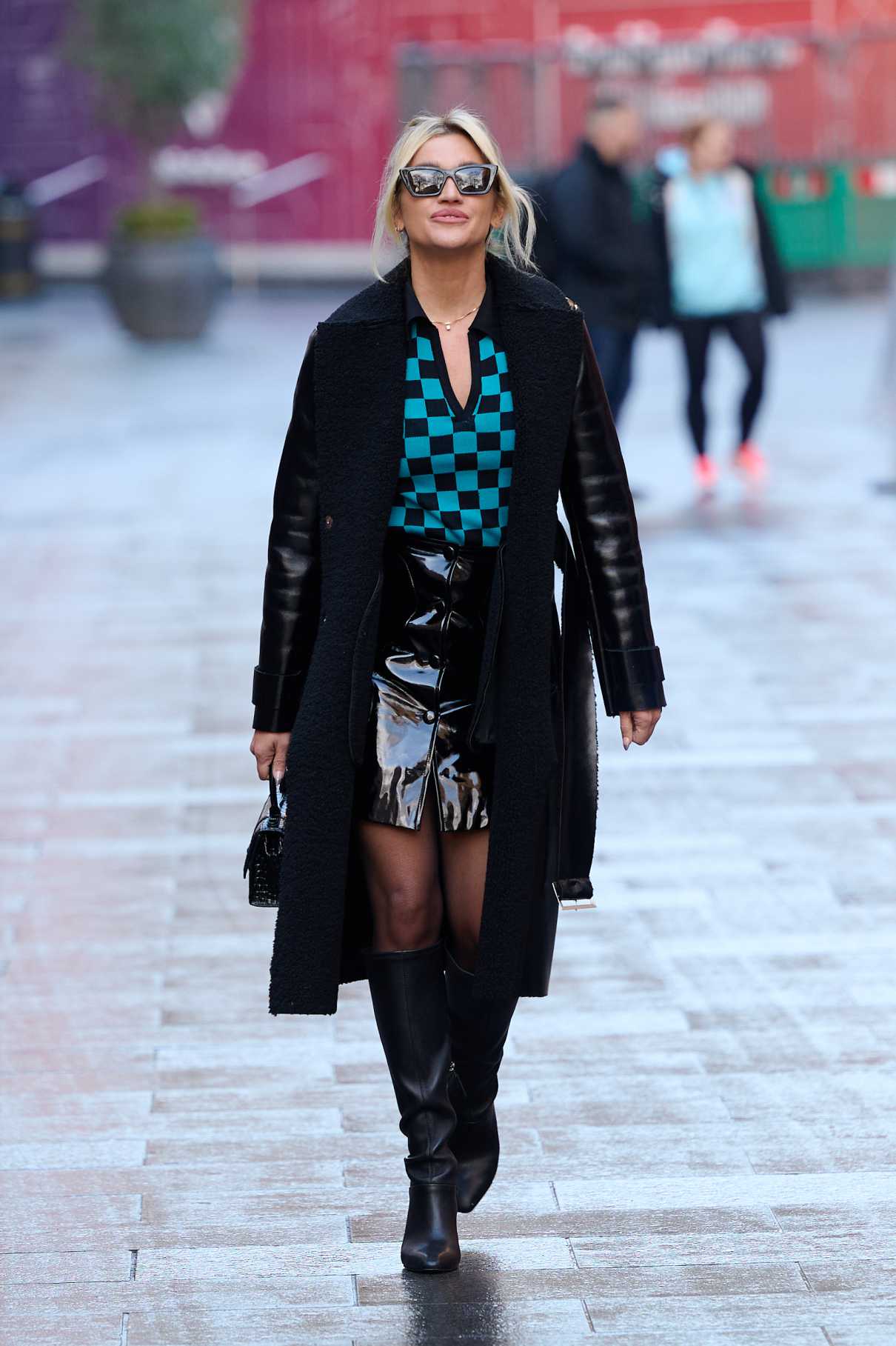 Ashley Roberts in a Black Leather Coat