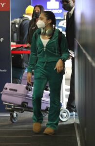 Avani Gregg in a Green Sweatsuit