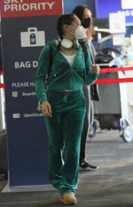 Avani Gregg in a Green Sweatsuit