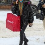 Corinne Olympios in a Black Puffer Jacket Goes Shopping on New Year’s Day in Aspen 01/01/2022