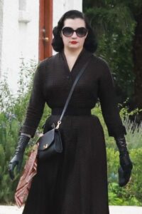 Dita Von Teese in a Black Dress