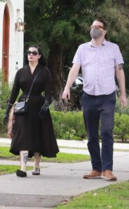 Dita Von Teese in a Black Dress