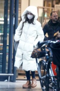 Emilia Clarke in a White Puffer Coat