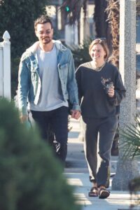 Hannah Brown in a Black Sweatshirt