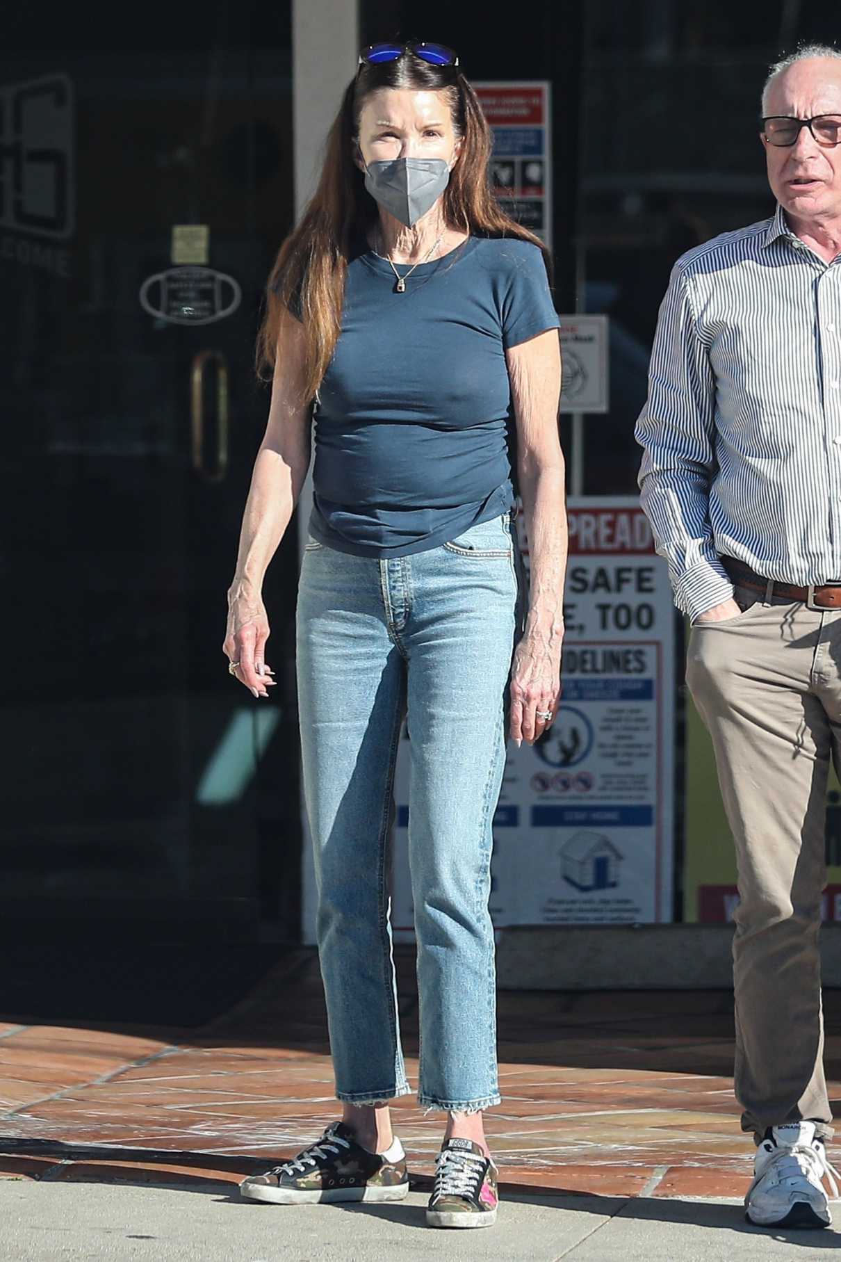 Janice Dickinson in a Blue Jeans
