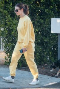 Lily James in a Yellow Sweatsuit