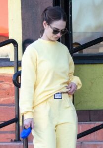 Lily James in a Yellow Sweatsuit