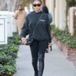 Lori Harvey in a Grey Hoodie Goes Shopping on Melrose Place in West Hollywood 01/06/2022