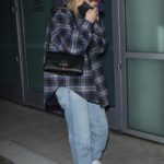 Madelyn Cline in a Plaid Shirt Arrives at the Lakers Game at the Crypto.com Arena in Los Angeles 01/09/2022