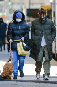 Meadow Walker in a Black Puffer Jacket