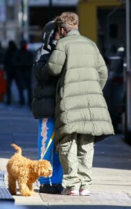 Meadow Walker in a Black Puffer Jacket