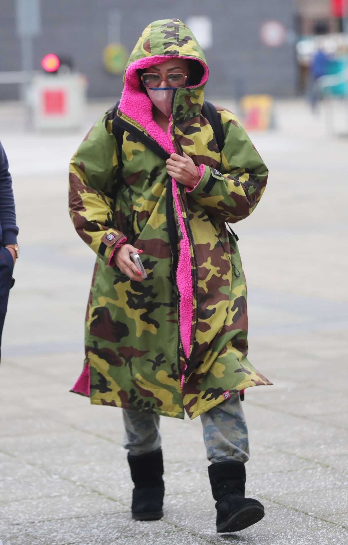 Melanie Brown in a Camo Coat Arrives at Leeds Dock for an Appearance on